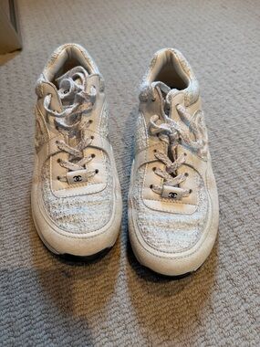 Chanel white and metallic tweed sneakers!  Very comfy and very hard to find!!